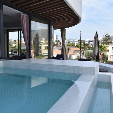 Luxury Complex Beachfront Apartment, Infinity Pool, Sauna, Gym And Large Terrace 토레몰리노스 외부 사진