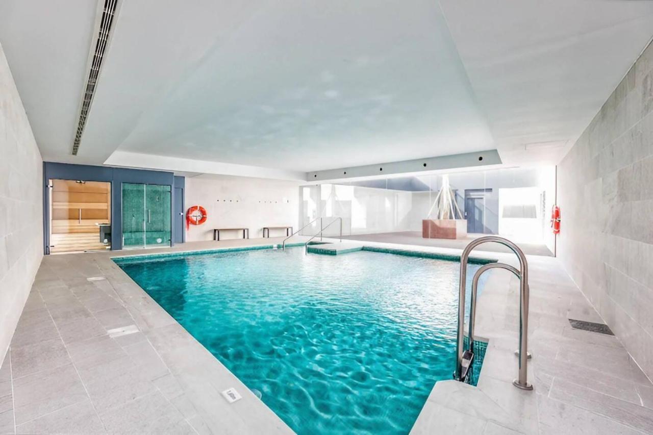 Luxury Complex Beachfront Apartment, Infinity Pool, Sauna, Gym And Large Terrace 토레몰리노스 외부 사진